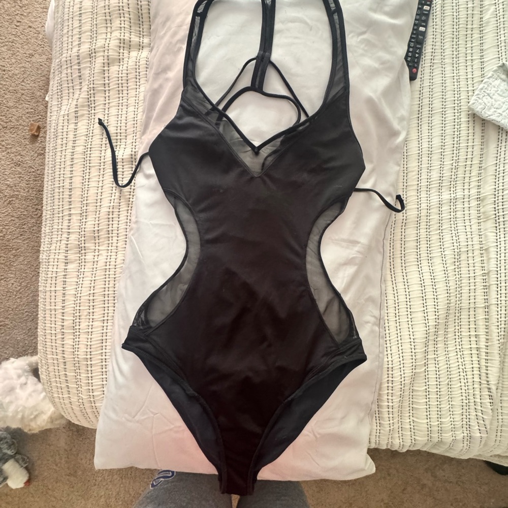 Sleek Black One Piece with Strappy Halter Neckline